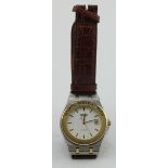 Gents Seiko electro-mechanical wristwatch circa 1989. The white dial with gilt baton markers, date