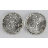 USA (2) 1oz silver Eagles: 1988 and 1990 in capsules.