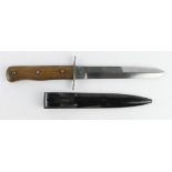 German WW2 original boot knife in its black scabbard brought back by a soldier as a souvenir from