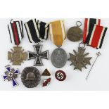 German selection of WW1 & WW2 medals and badges etc. Iron Cross WW1 maker marked 'KO'. Honour