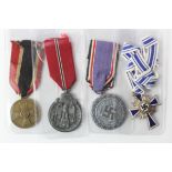 German WW2 medals including Mothers Cross in silver, Russian Front medal, Lufftscutz medal and War