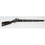 Flintlock canon barrel musket of Far East origin with European lock carved stock and embossed barrel