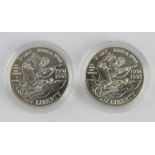 USA (2) D-Day commemorative silver Dollars 1995D, BU in capsules.