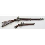 Flintlock replica guns, Dragoon type pistol, woode stock and metal construction, lock in w/order.
