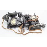 Two black bakelite telephones (one by Siemens)