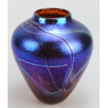 Carin Von Drehle. Iridescent blue trailed baluster vase, signed along base edge. Made during her