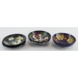 Moorcroft. Four Moorcroft dishes & plates with various patterns, makers marks to base of each,