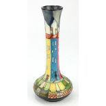 Moorcroft slender vase, depicting houses of various colours, designed by Kerry Goodwin, dated