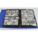 British Cw in bulging blue folder with stocksheets containing a large quantity of sets & singles,