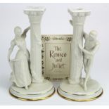 Franklin Mint Romeo & Juliet bisque porcelain candlesticks, makers marks to base, height 25cm