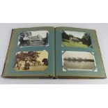 Essex postcards in old album, incl Walton on Naze, West Mersea, Clacton Butlins, etc (approx 74)
