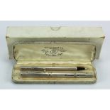 Watermans Ideal silver fountain pen & pencil set, hallmarked 'F.D.W, London 1925', initials 'J.R.W.'