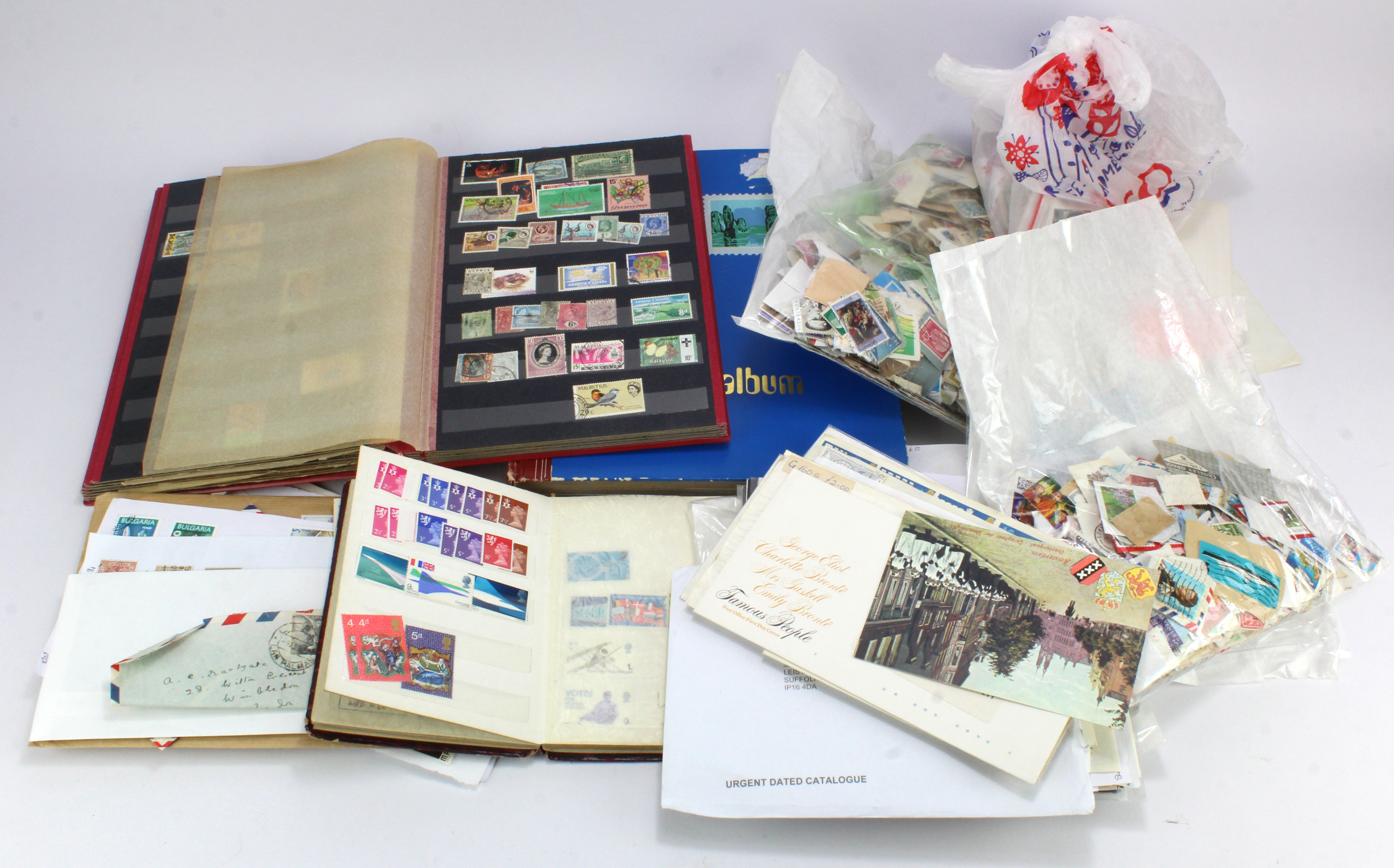 Large box of mixed material loose in packets, on and off paper, stockbook, etc (Qty) Buyer collects