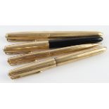 Parker. A group of three Parker fountain pens and a Parker propelling pencil