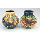 Moocroft. Two small Moorcroft vases 'Anna Lily' & 'Celtic Web' patterns, makers marks to base of