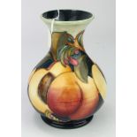 Moorcroft 'Peaches' pattern vase, designed by Emma Bossons, dated 2009, makers marks to base, height