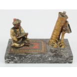 After Bergman. Cold painted bronze striker depicting a figure on a carpet, on a marble base,