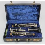Clarinet. A four piece clarinet (no. 285492), contained in original fitted case