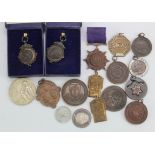 British & World Sports-related Medals & Fobs (17) early to late 20thC, mostly bronze and base.