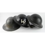 ARP Wardens and Civil Defence helmets three of.