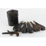 19th Century collection of leather and brass powder and shot flasks with scarce powder storage tin
