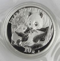 China 1oz .999 silver Panda 10 Yuan 2005 BU in capsule in original sealed cellophane packaging.