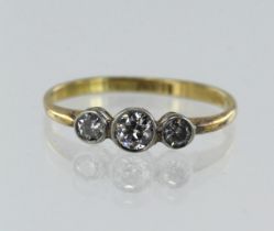 Yellow gold (tests 18ct) vintage diamond trilogy ring, three graduating round brilliant cut