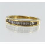 18ct yellow gold diamond half eternity ring, set with tapered baguette cuts, TDW approx. 0.25ct,