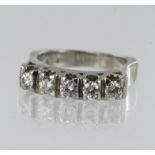 White gold (tests above 14ct) diamond five stone ring, five round brilliant cut diamonds TDW approx.