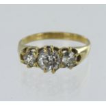 Yellow gold (tests 18ct) antique diamond trilogy ring, three graduating old cuts principle approx.