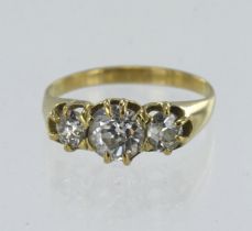 Yellow gold (tests 18ct) antique diamond trilogy ring, three graduating old cuts principle approx.