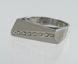 18ct white gold contemporary diamond dress ring, eight single cuts, TDW approx. 0.04ct, head