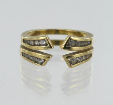 Yellow gold (tests 18ct) diamond dress ring, set with twenty graduating round brilliant cuts TDW