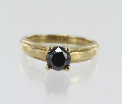 9ct yellow gold black synthetic diamond solitaire, one 6mm round brilliant cut, four claw set,