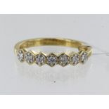 18ct yellow gold Canadian diamond half eternity ring, seven round brilliants TDW 0.25ct, colour G-H,