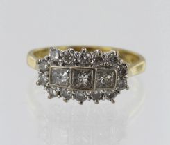 18ct yellow gold diamond trilogy cluster ring, TDW approx. 0.97ct, three graduating princess cut