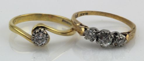 Two 18ct gold/tests 18ct diamond rings, solitaire approx.0.15ct, finger size M/N, trilogy TDW