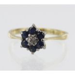 18ct yellow gold diamond and sapphire daisy cluster ring, one round brilliant cut diamond approx.