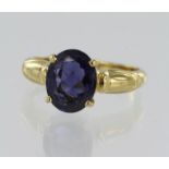 18ct yellow gold iolite solitaire ring, one oval iolite measuring 10mm x 8mm, four claw setting,