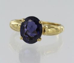 18ct yellow gold iolite solitaire ring, one oval iolite measuring 10mm x 8mm, four claw setting,