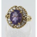 9ct yellow gold amethyst and white topaz cluster ring, one oval amethyst approx. 2.779ct, twelve