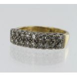 18ct yellow gold two row half eternity ring set with eighteen round brilliant cut diamonds