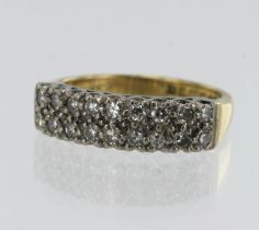 18ct yellow gold two row half eternity ring set with eighteen round brilliant cut diamonds