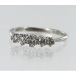 White gold (tests 18ct) diamond five stone ring, five graduating old cut diamonds, TDW approx. 0.