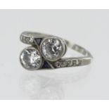 Platinum (tests 900) Art Deco diamond and sapphire Toi Et Moi ring, TDW approx. 0.91ct, two old