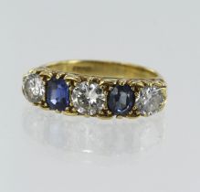 Yellow gold (tests 18ct) diamond and sapphire five stone ring, two oval sapphires measuring