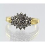 18ct yellow gold diamond cluster ring, set with twenty-three round brilliant cuts, TDW approx. 0.