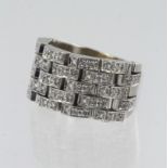 White gold (tests 18ct) Chimento diamond articulated panther link ring, five rows of round brilliant