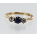 Yellow gold (tests 18ct) diamond and synthetic sapphire trilogy ring, syn. sapphire measures approx.