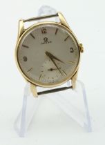 Gents 9ct gold cased Omega manual wind wristwatch, circa 1961. The champagne dial with Arabic